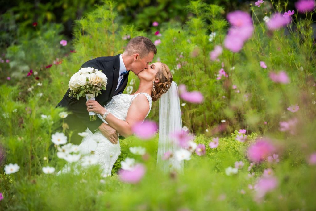 elopement photographer wedding couple in flowers